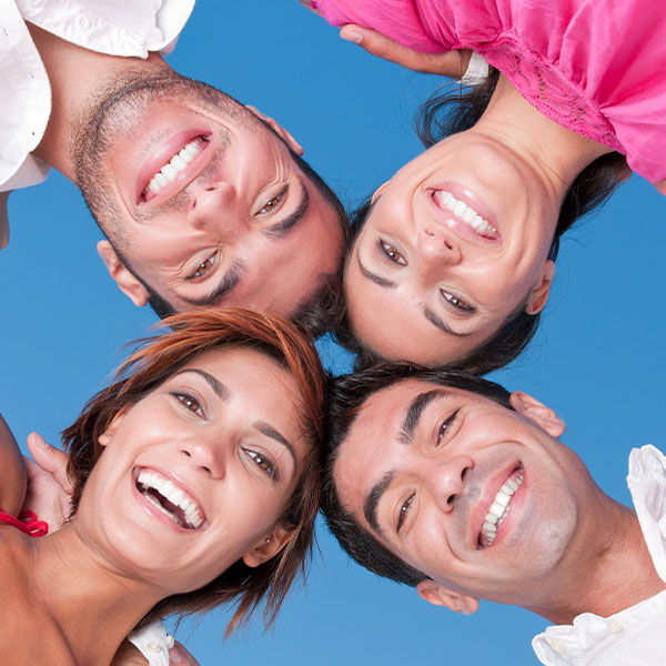 Happy group of friends smiling outdoors