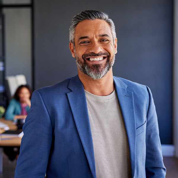 Happy man smiling wearing suit