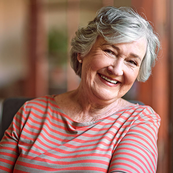 Happy woman smiling inside